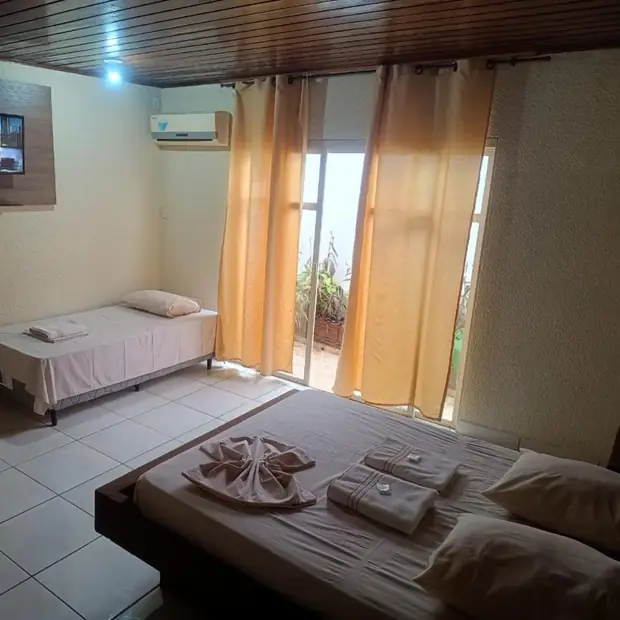 Quarto com porta para o pátio